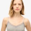Top corto con spalline sottili e bordi in pizzo
