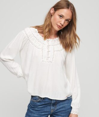 Top in tessuto con bordi in pizzo