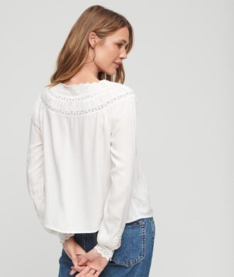 Top in tessuto con bordi in pizzo