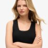 Top senza maniche con bordi in pizzo Vintage della linea Athletic Essentials